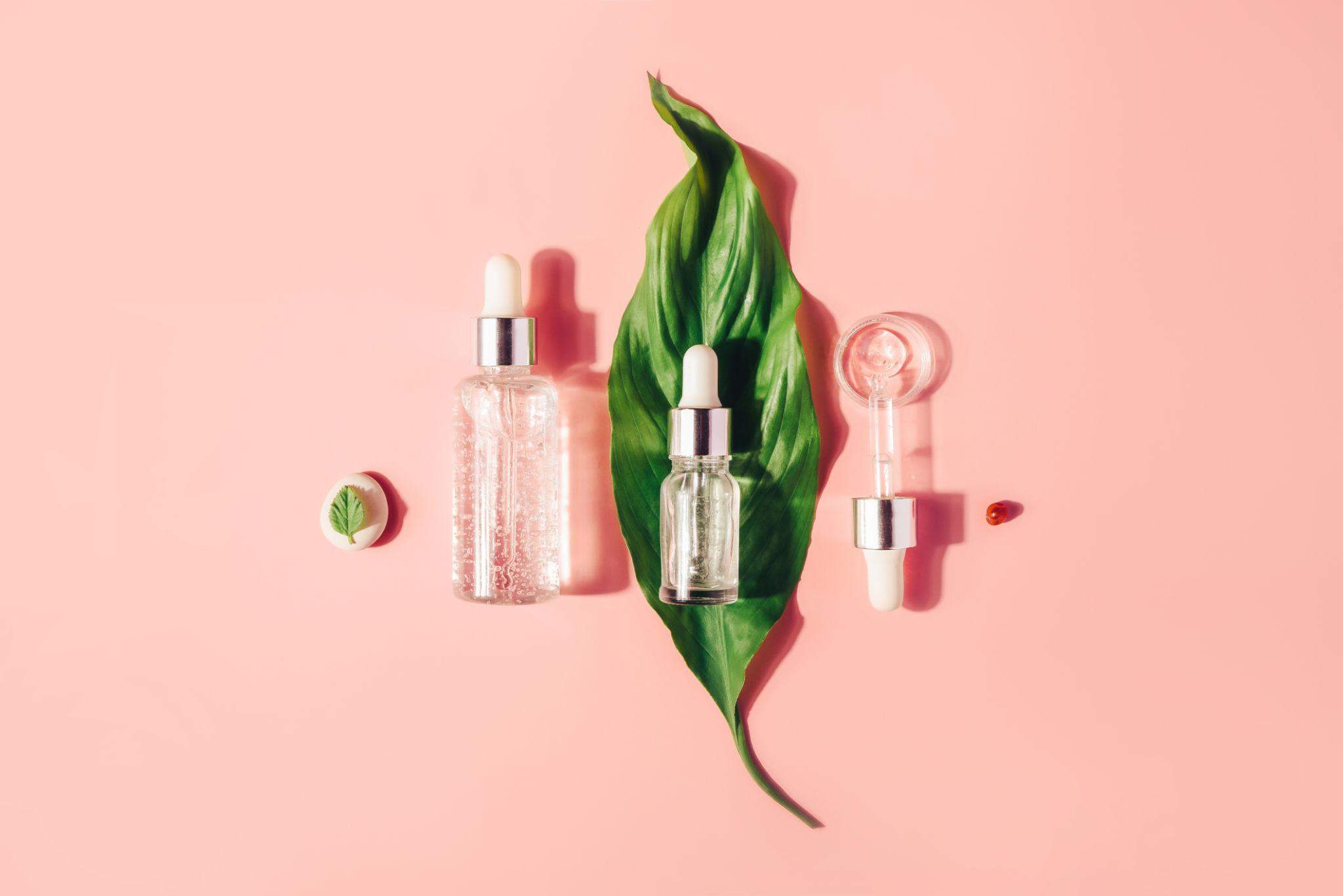 Minimalist skincare serum with a glass dropper and lightweight translucent texture representing bio-based silicone alternatives such as hemisqualane and squalane